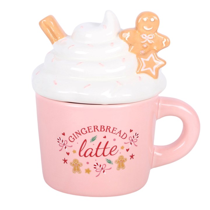 Quemador de wax melts taza de Navidad jengibre en contexto decorativo, junto a elementos navideños, estilo artesanal y elegante
