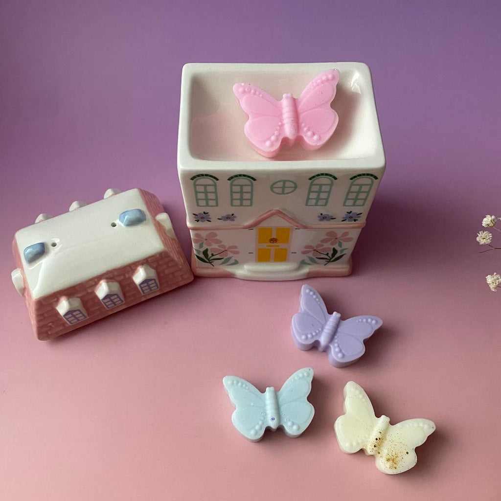 Detalle quemador casita con wax melts