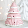 Quemador de wax melts con forma de árbol de Navidad, vista frontal sobre fondo claro, diseño artesanal navideño y decorativo