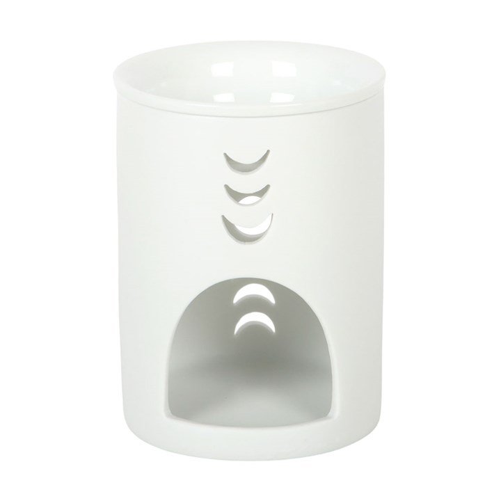 Detalle de quemador de wax melts fases lunares en blanco, acabado artesanal con motivo lunar, decoración de hogar serena y sofisticada